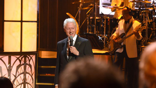Bill Clinton takes cute picture that will definitely not devolve into a screaming internet grudge match
